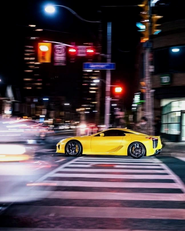 Yellow Lexus LFA at night